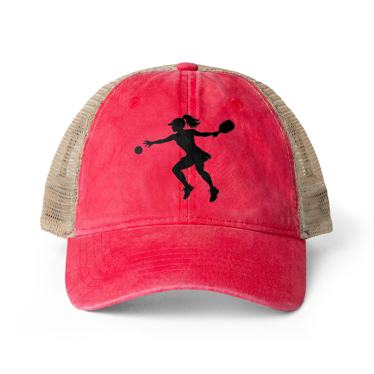 A distressed trucker-style baseball cap with a bright pinkish-red front panel and brim, beige mesh side panels, and a black silhouette graphic of a female pickleball player on the front.